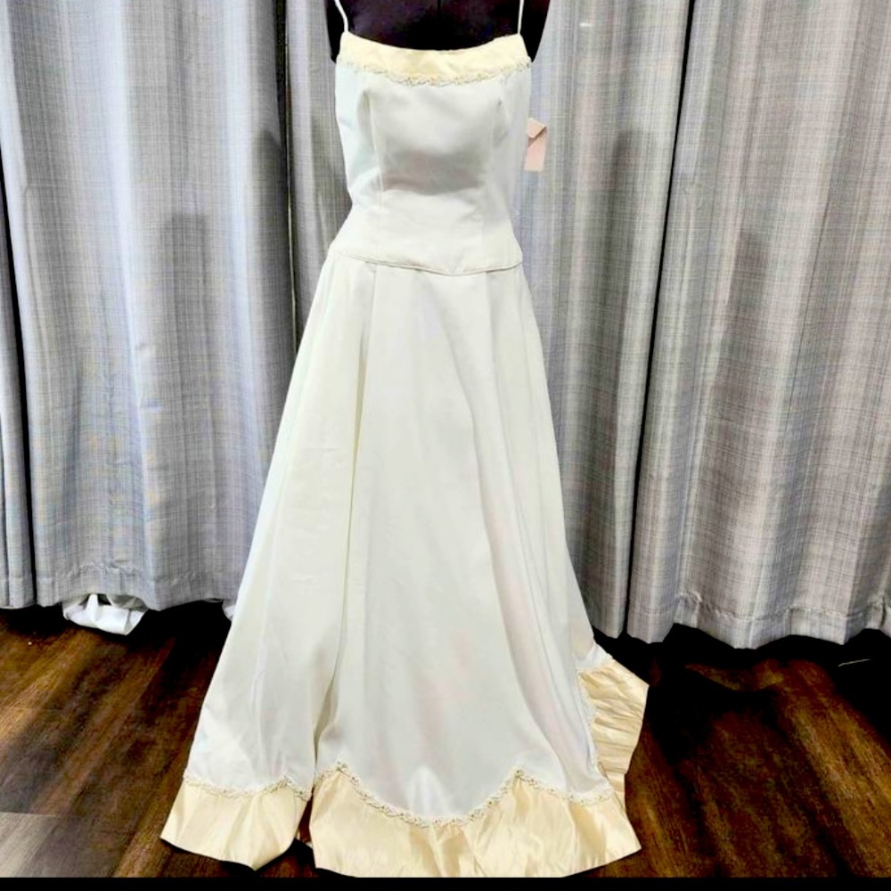 Incredible satin wedding dress with champagne trim and beading, NWT, unworn.
